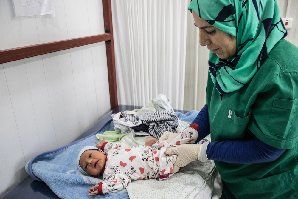 Baby Malik and MSF midwife Layla, Iraq