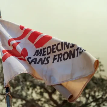 MSF flag blowing in the wind at Aweil project base.
