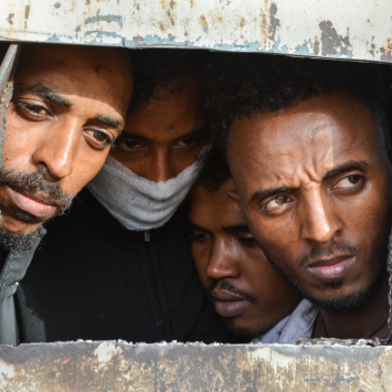 Migrants and refugees in Zintan and Gharyan detention centres in Libya